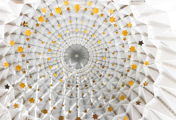 A photograph of a white canopy of stars